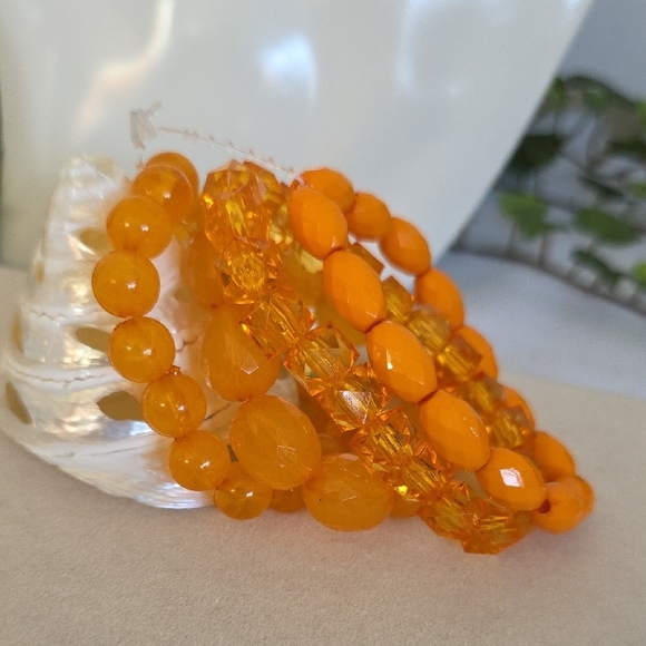 Jewelry - Set of Four Orange Faceted Acrylic Bead Bracelet